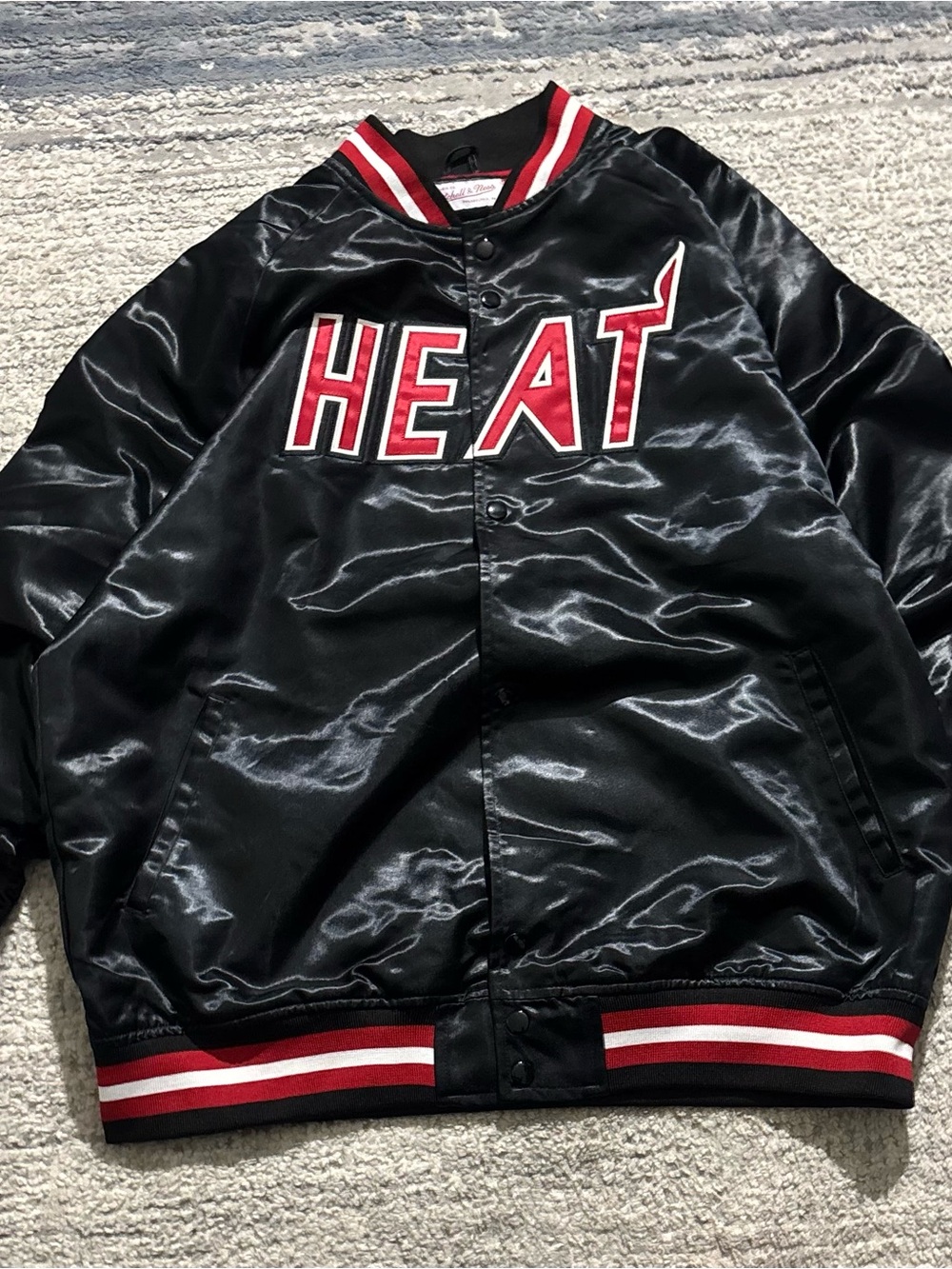 Mitchell & Ness Black Satin 'HEAT' Bomber Jacket with Red Accents